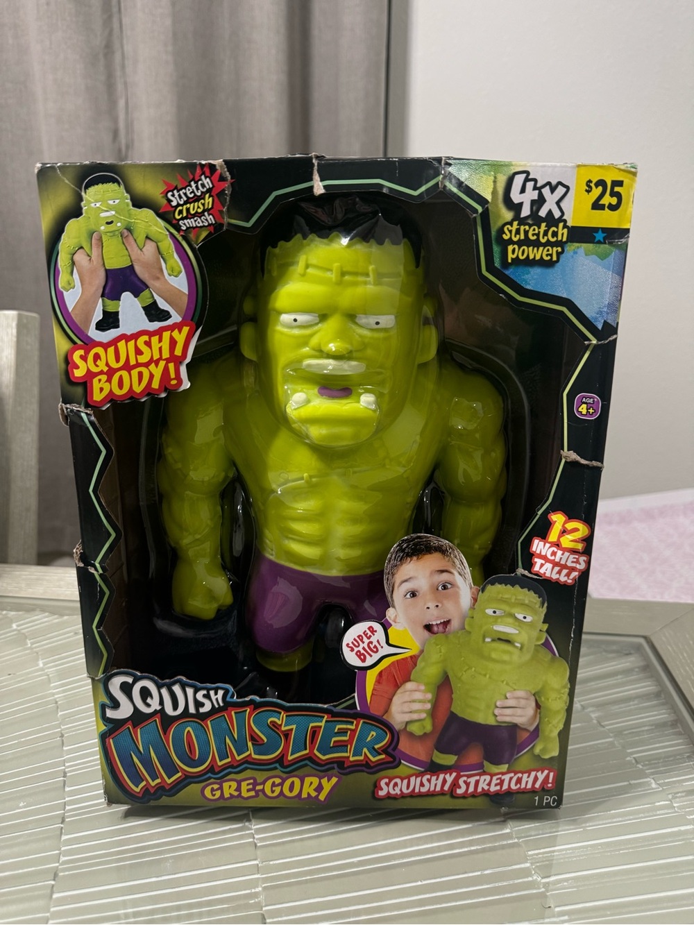 adidas Green Squish Monster Stretch Toy with Purple Shorts